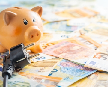 Piggy bank on international currency.