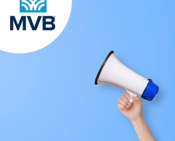 Hand holding a megaphone
