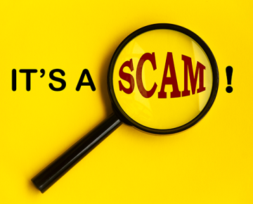 the words 'it's a scam' against a yellow background and a magnifying glass