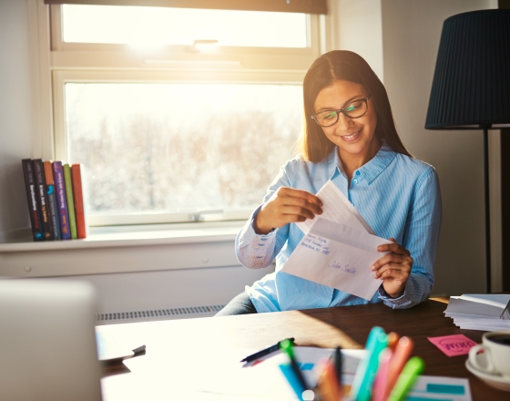 Individual looking through mail