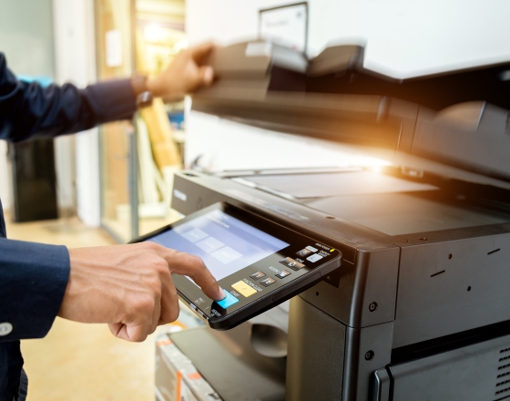 Person changing printer settings. 
