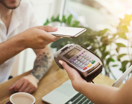 Person Paying with Digital Wallet Device