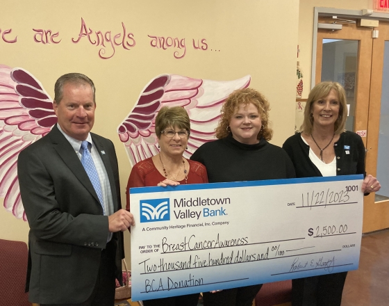 Check presentation with Breast Cancer Awareness Inc