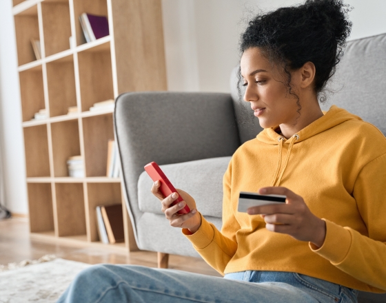 Female Shopping on Cell Phone