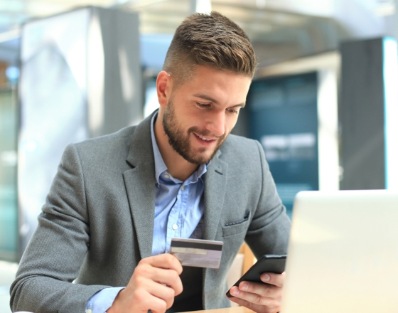 Man Using Credit Card